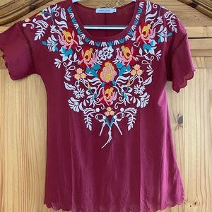 Embroidered wine color top